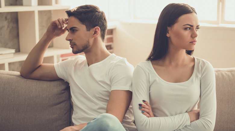 Couple looking away from each other