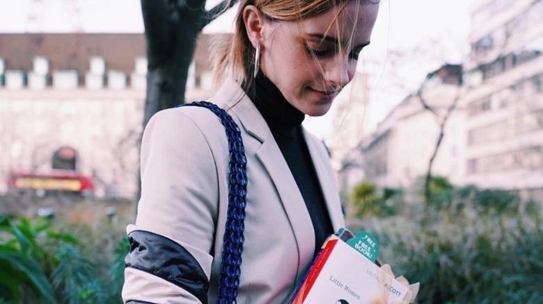 Emma Watson with book