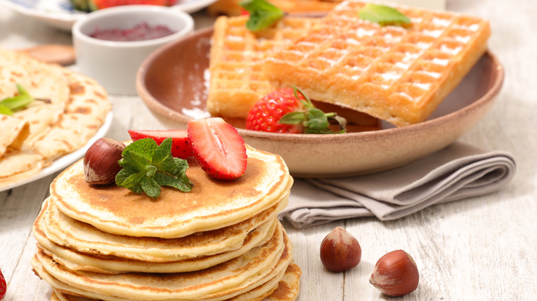 Stacks of waffles and pancakes