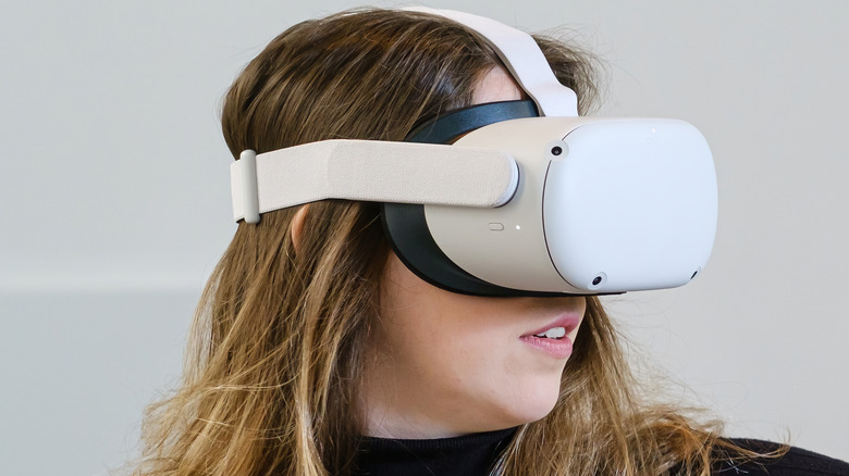 Woman wearing an Oculus VR headset