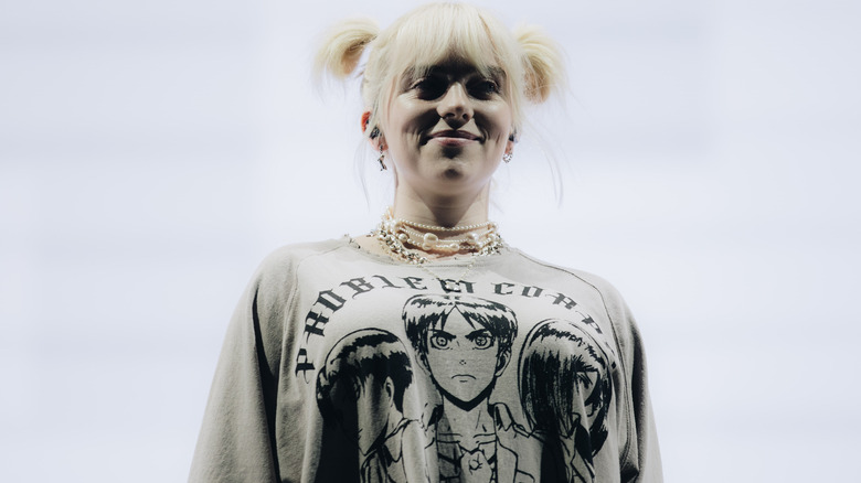 Billie Eilish performing at a music festival