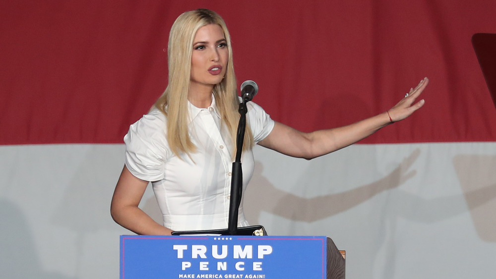 Ivanka Trump speaking at a lectern 