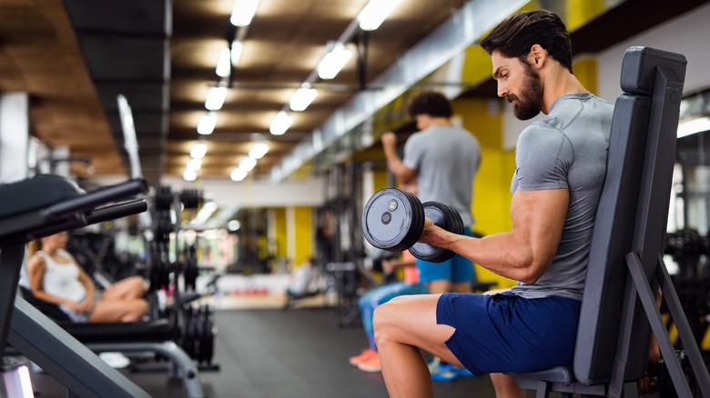 People work out at a gym