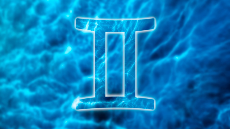 Gemini sign, water background