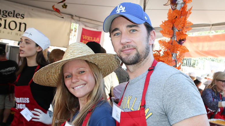 DOOL stars Billy Flynn and Marci Miller smile for the camera.