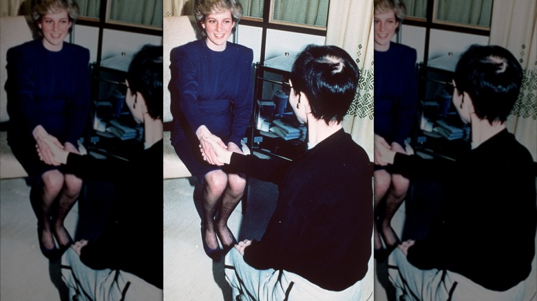 Princess Diana shaking patient's hand