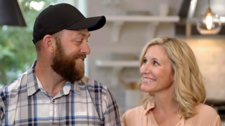 Jenny and Dave Marrs smiling at each other