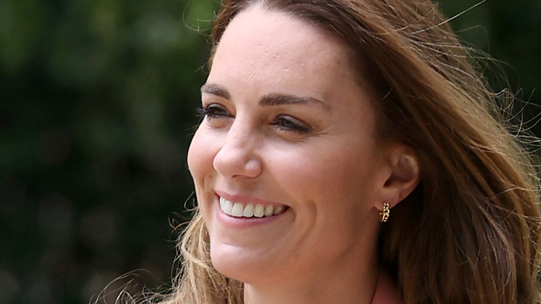 Kate Middleton smiling during royal duties