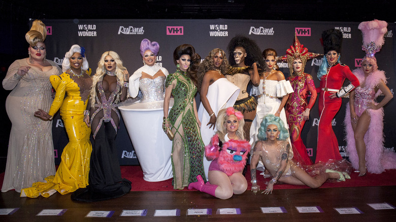 The stars of RuPaul's Drag Race pose together at an event