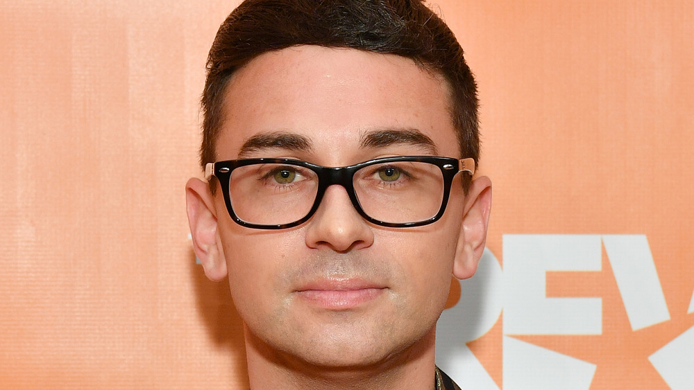 Christian Siriano posing at event