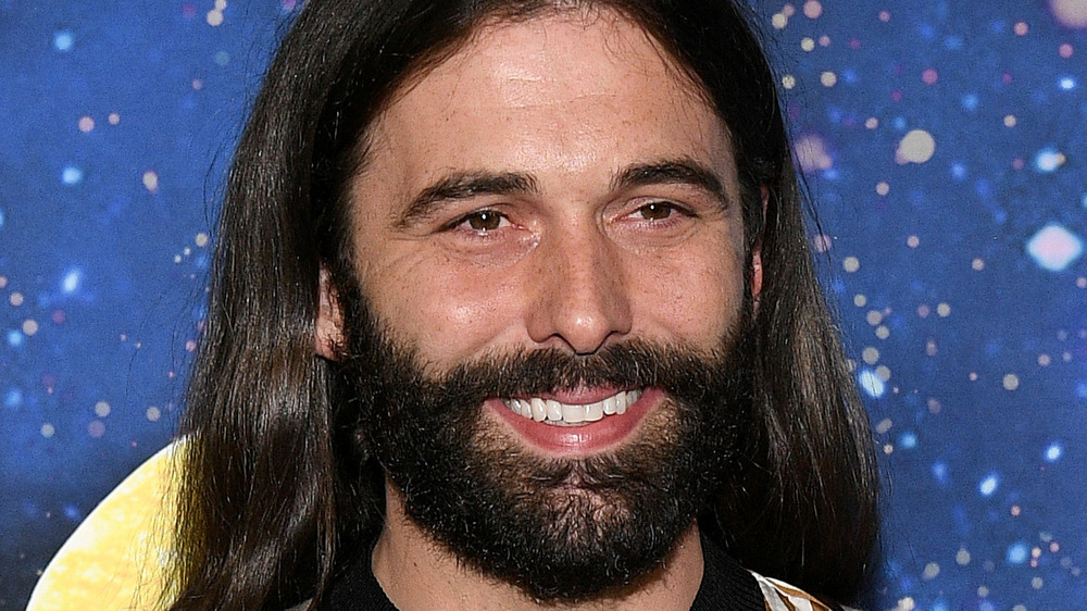 Jonathan Van Ness smiling on red carpet