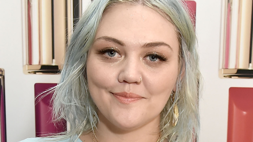 Elle King poses at an event