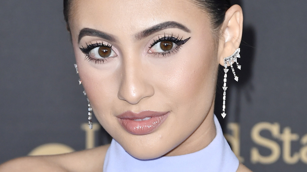 Francia Raisa posing at event
