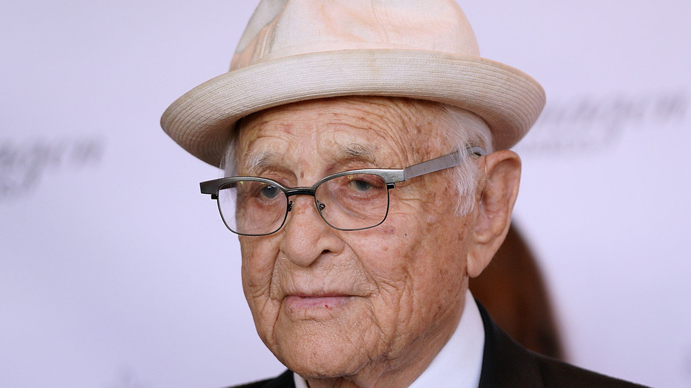 Norman Lear poses on the red carpet