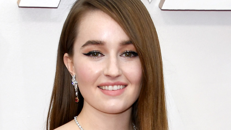 Kaitlyn Dever poses on the red carpet