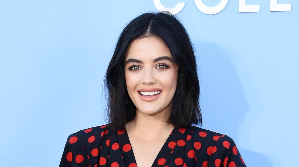 Actress Lucy Hale poses at an event