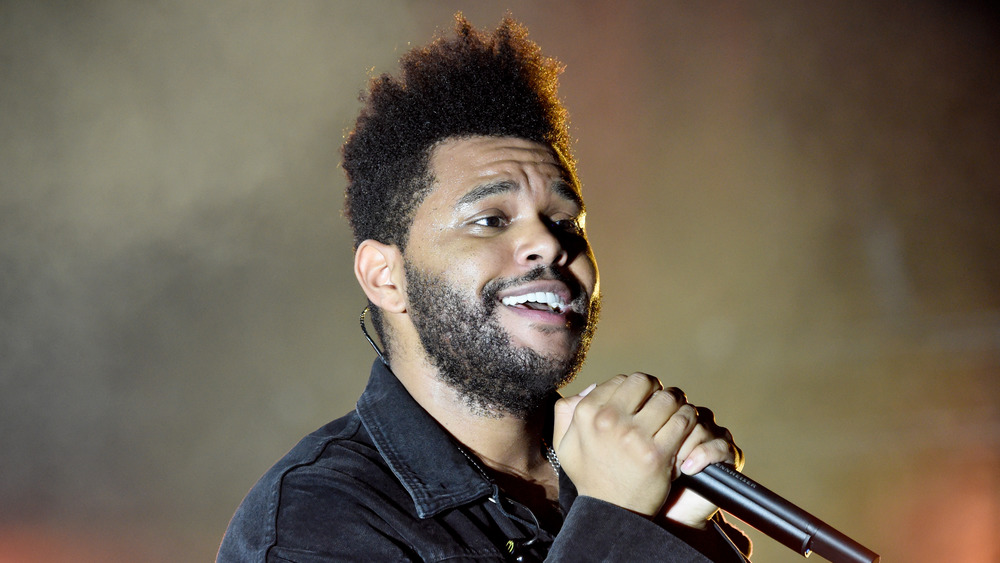 The Weeknd performing