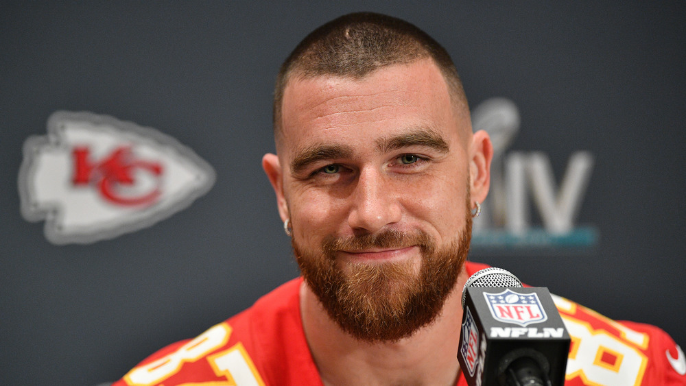 Kansas City Chiefs' Travis Kelce smiling at press conference