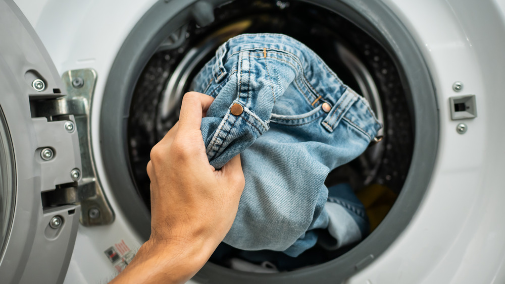 Jeans getting tossed in washing machine