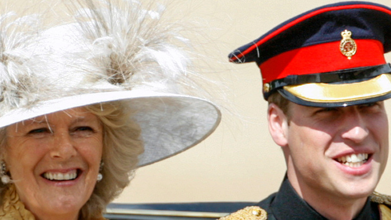 Camilla Parker Bowles and Prince William smiling