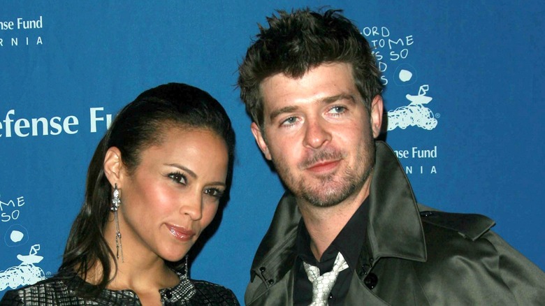 Paula Patton and Robin Thicke at event
