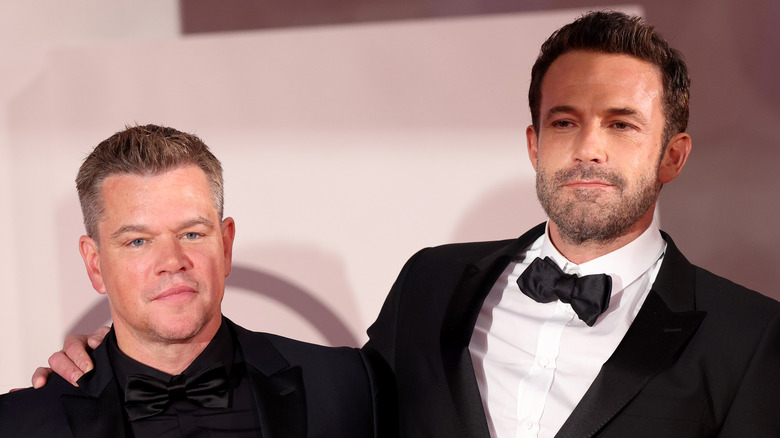 Ben Affleck stands next to Matt Damon