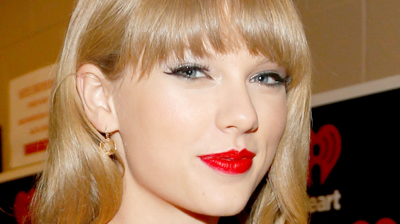Taylor Swift smiling red lipstick