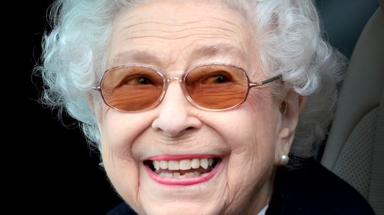 Queen Elizabeth with tinted glasses