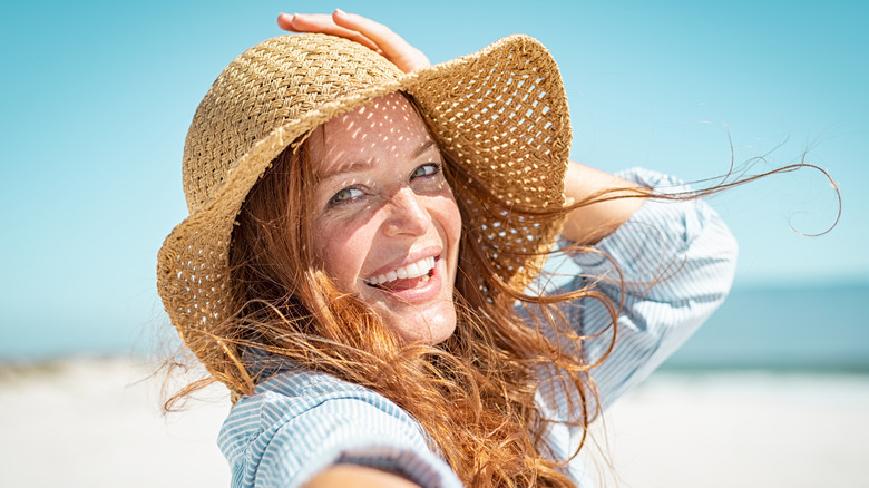 woman wearing a sunhat 