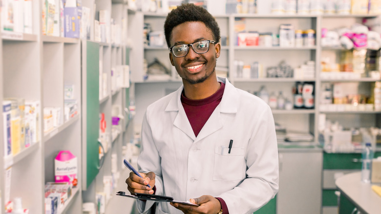 A pharmacist smiling