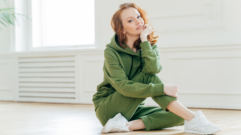 Woman wearing a monochrome sweatsuit 