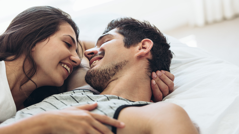 Young couple gazing into each other's eyes