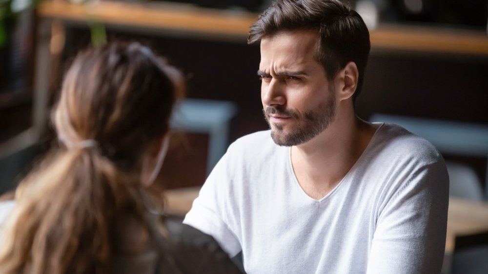 Unhappy looking couple