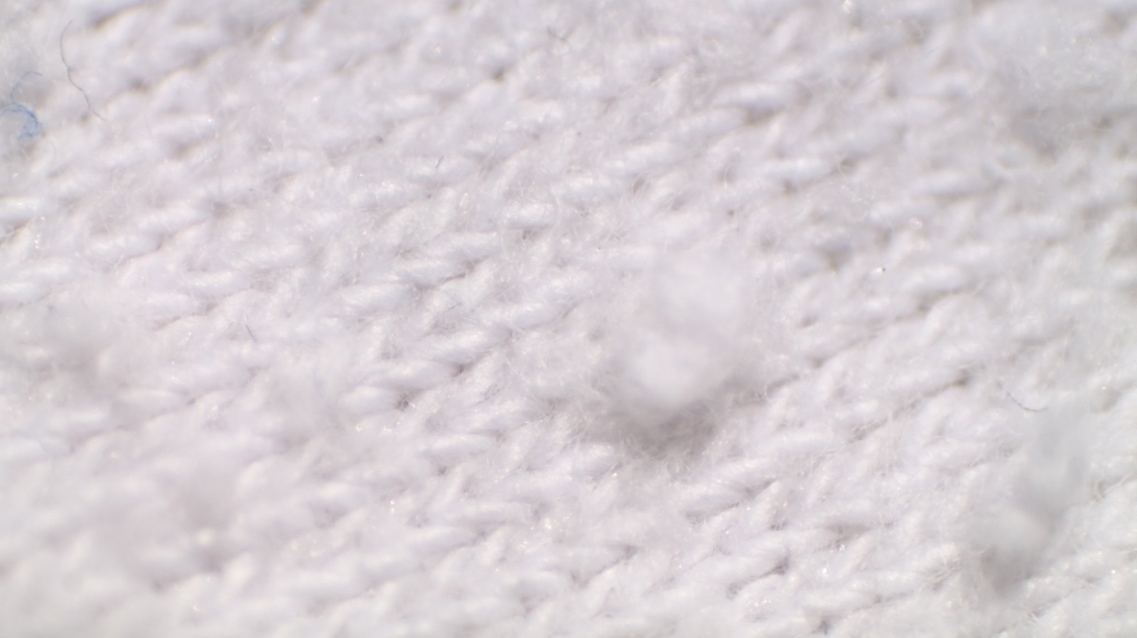 Here's How To Save A Sweater That Is Starting To Pill