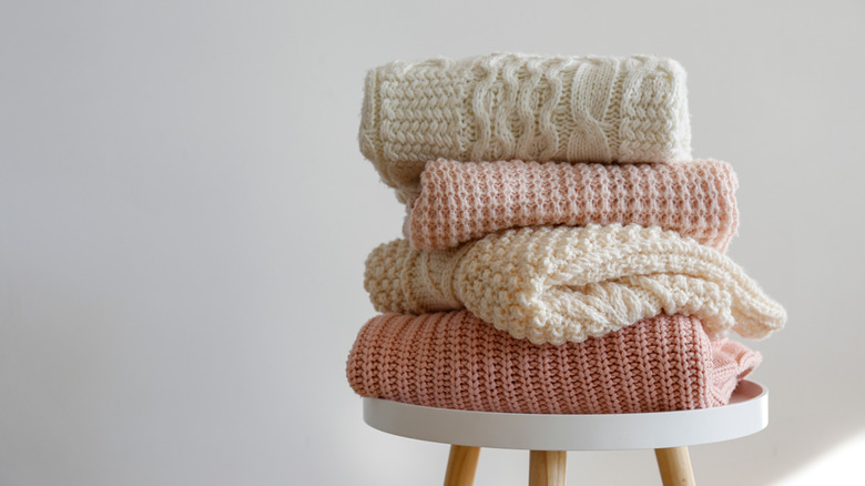 Pile of sweaters