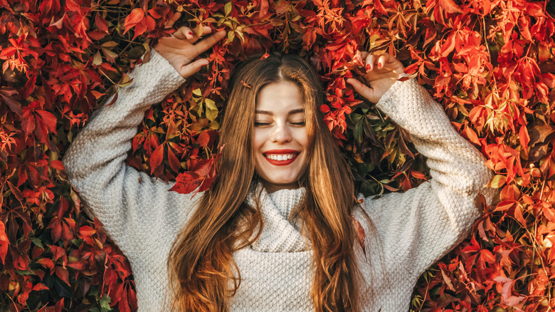 woman in leaves 