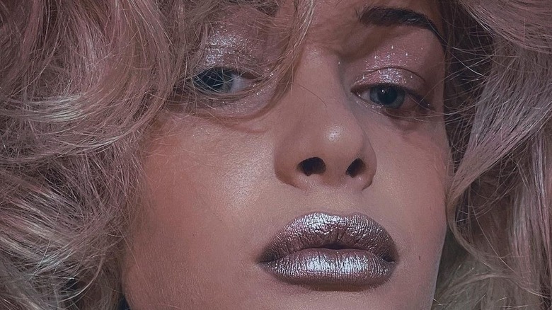 Woman wearing silver lipstick