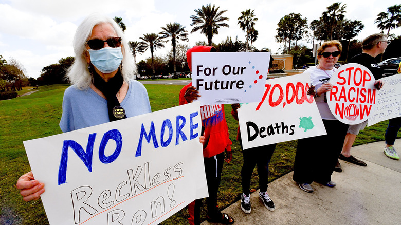 people protesting Ron DeSantis' policies