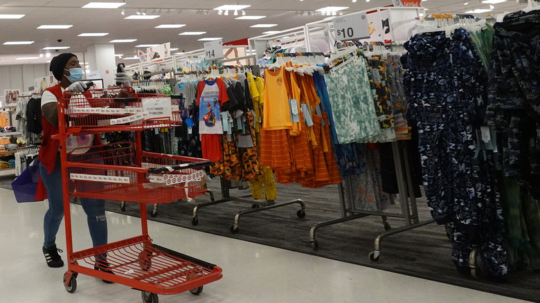 Target employee walks through aisles