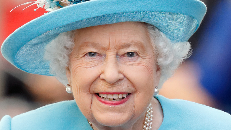 Queen Elizabeth smiling at an event