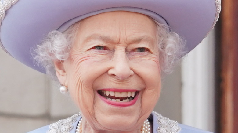 Queen Elizabeth purple hat
