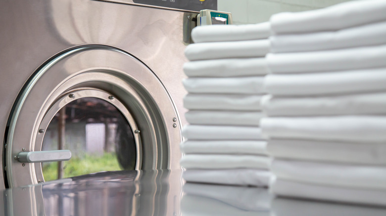 Sheets in front of washing machine