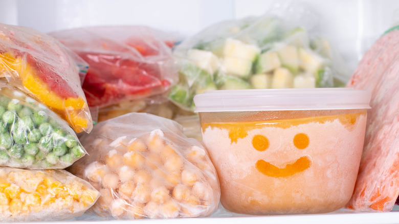 Bags of frozen vegetables in a freezer 