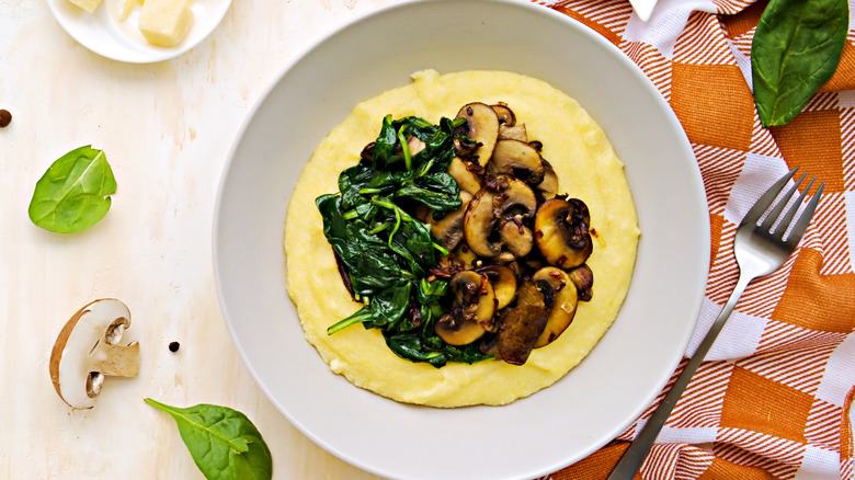 Plated grits with mushrooms