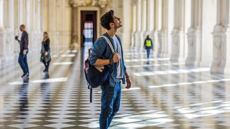 Man looking around museum