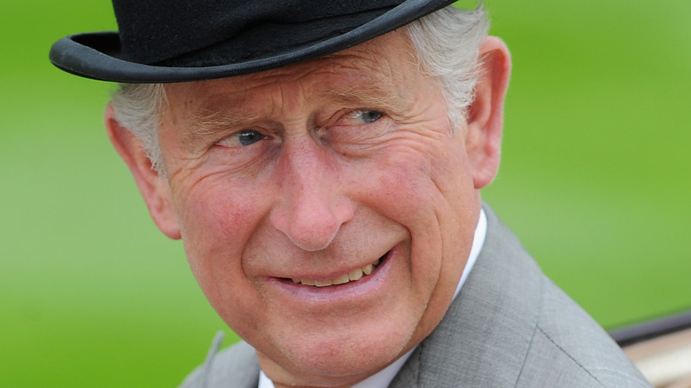 Prince Charles in top hat smiling