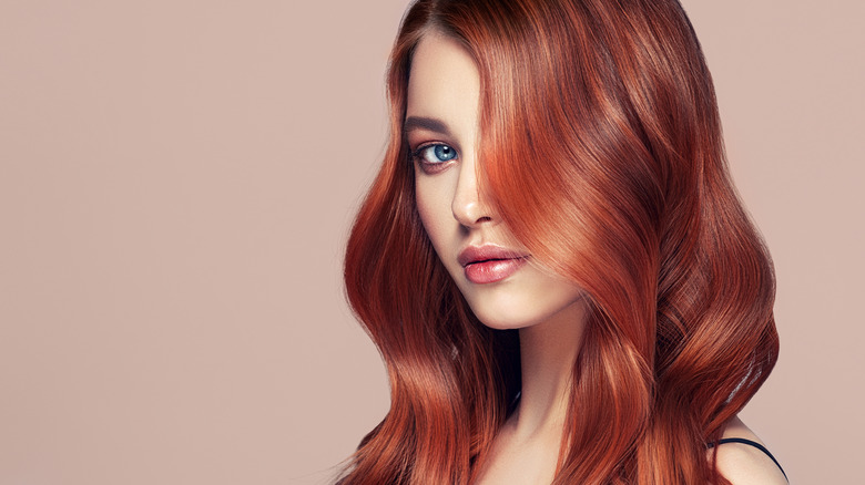 Woman with wavy red hair