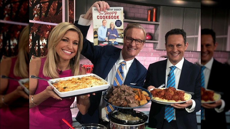 Ainsley Earhardt shows off a chicken recipe on Fox with her colleagues.
