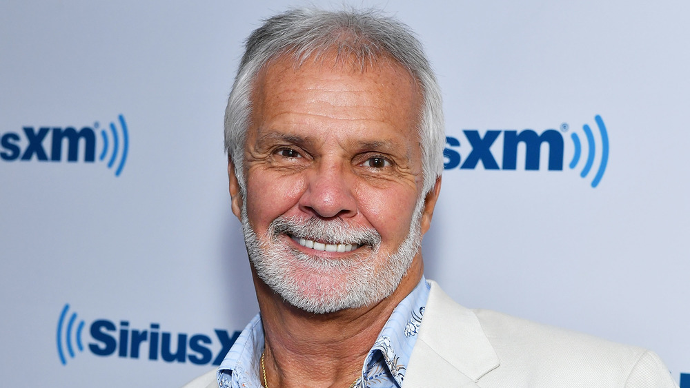 Below Deck's Captain Lee Rosbach smiling at SiriusXM