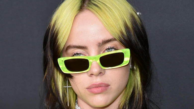 Billie Eilish wearing glasses